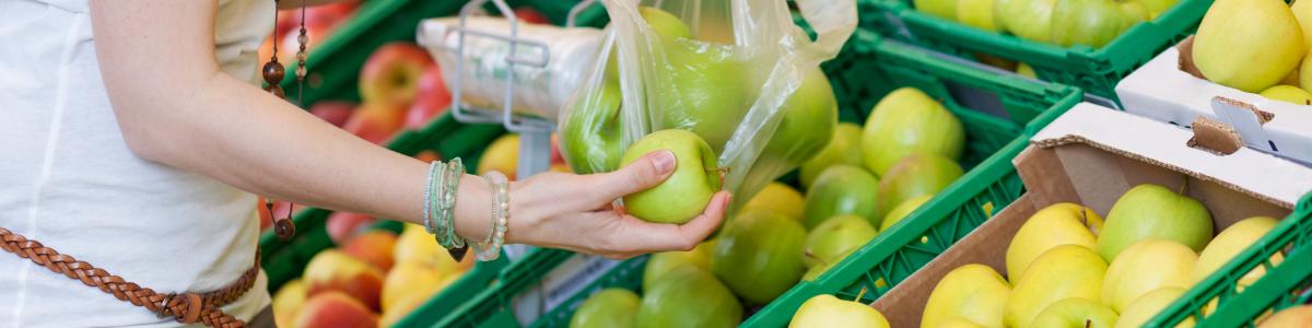 Person shopping for vegetables